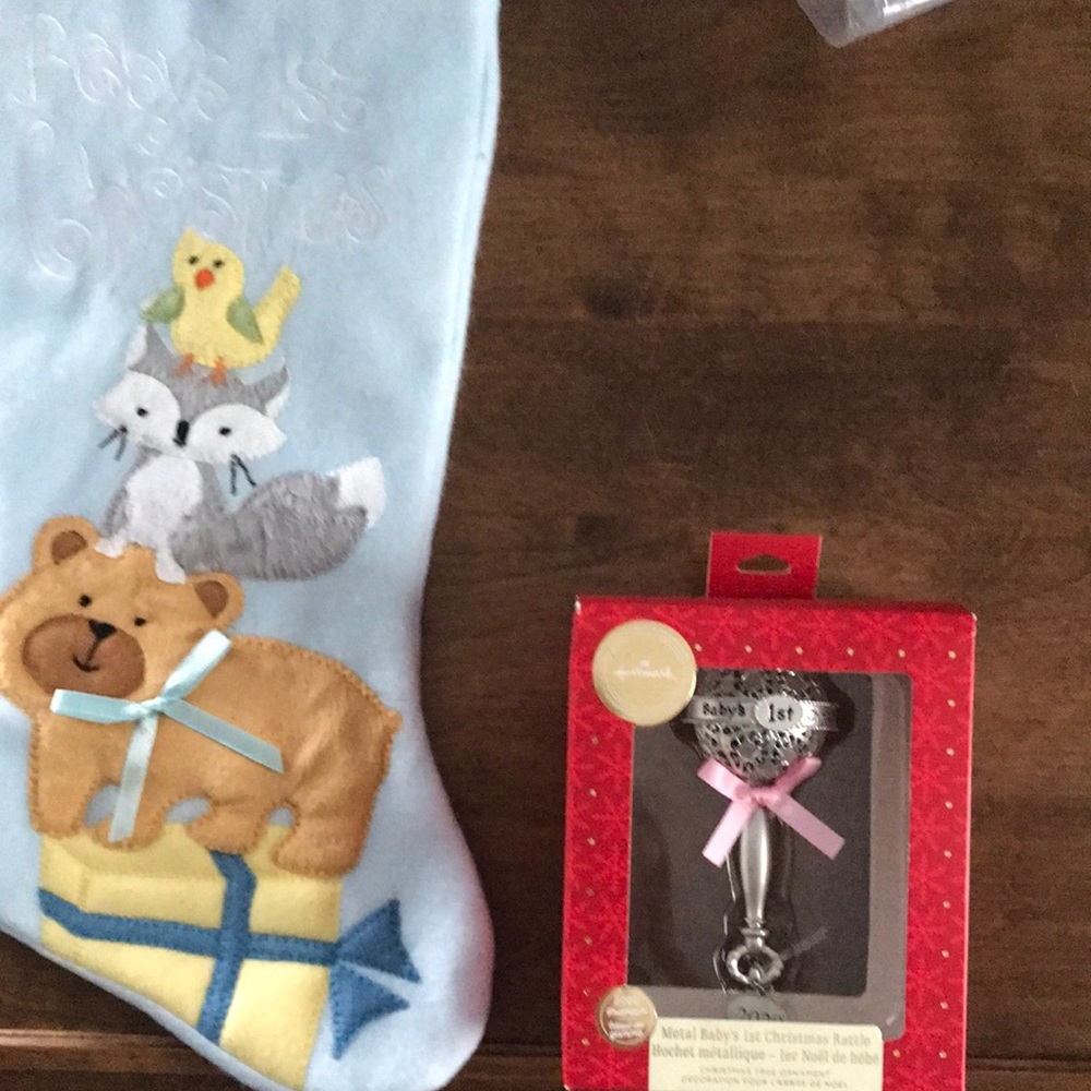 Stocking babies first Christmas and a rattle decoration for the tree.